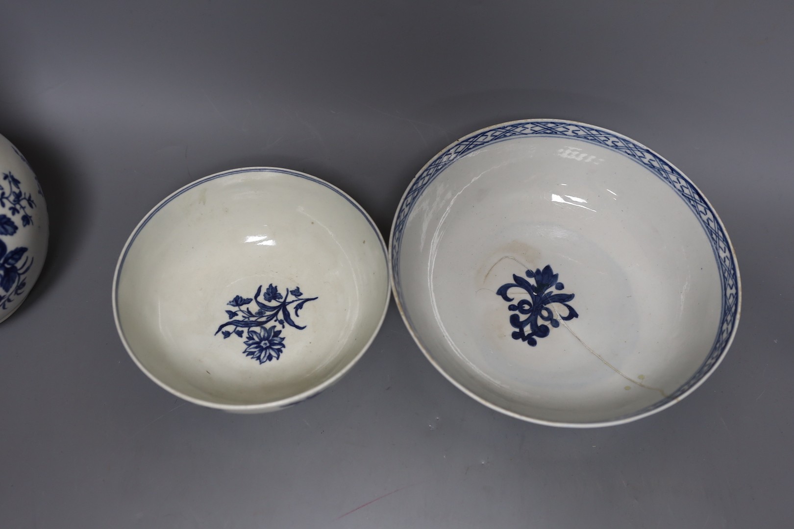 A Chaffers Liverpool rare bowl, a Worcester bowl, a mug with the Gilliflower pattern, three further Worcester teawares, Chrysanthemum, Mansfield and Prunus Root and a Worcester guglet, all late 18th century, Largest 23cm